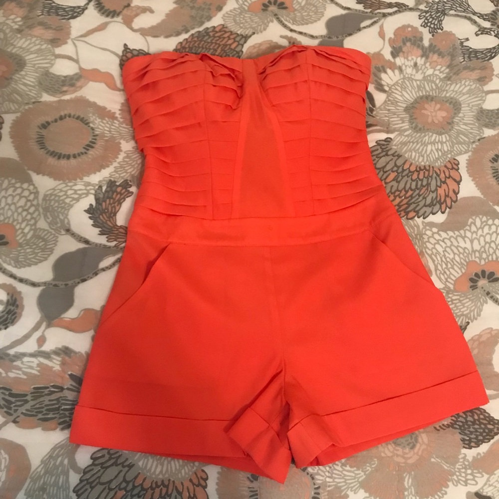 Bebe coral/orange romper